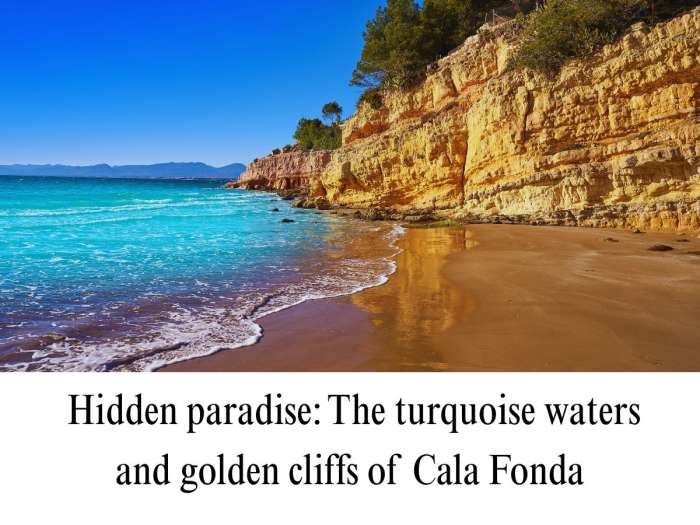 Landscape view of the secluded cove of Cala Fonda (Waikiki Beach) surrounded by yellow limestone cliffs in the Tamarit-Punta de la Móra nature reserve on Catalonia's Costa Daurada.