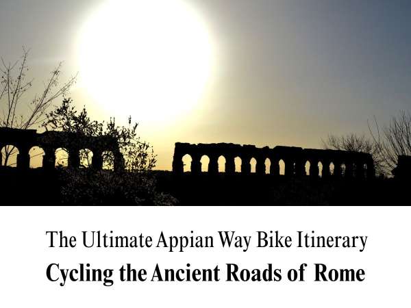 A high-contrast photograph showing the dark silhouette of ancient Roman aqueduct arches stretching across the landscape against a bright, hazy sky. A massive, brilliant sun dominates the upper left portion of the image, casting a strong backlight over the ruins and sparse trees. The lower portion features a clean white block containing the custom title text: "The Ultimate Appian Way Bike Itinerary" in a thin serif font, and "Cycling the Ancient Roads of Rome" in bold.