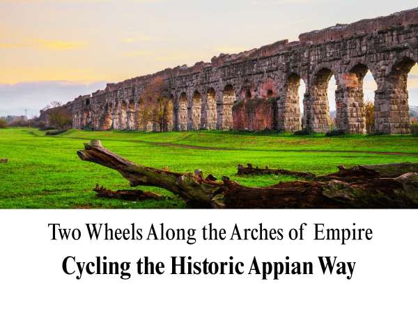 A scenic, wide-angle photograph capturing the majestic expanse of ancient Roman aqueduct ruins. The massive stone structures stretch across a lush, vibrant green grassy field under a soft twilight sky with faint yellow hues. In the immediate foreground, a weathered, fallen tree trunk adds a rustic, natural element to the landscape. The bottom portion features a clean white block containing the custom title text: "Two Wheels Along the Arches of Empire" in a thin serif font, and "Cycling the Historic Appian Way" in bold.